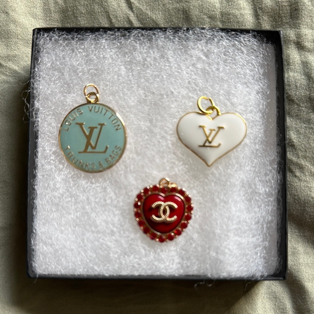 Chanel and Louis Vuitton Pendants.